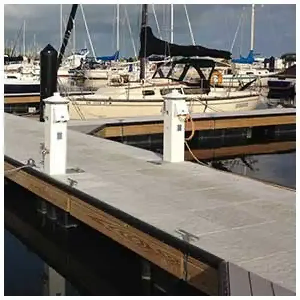 Photograph of sail boats at a boat dock.