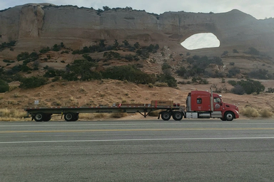 hotograph of a flatbed trailer.
